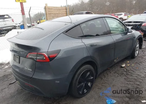 2023 Tesla Model Y Awd/Long Range Dual Motor All-Wheel Drive z USA, uszkodzony, nr VIN 7SAYGDEE7PA042087